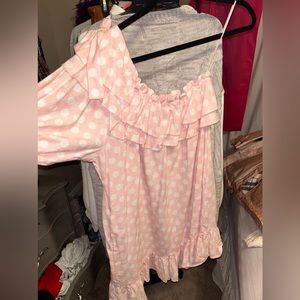 White a pink dotted dress.